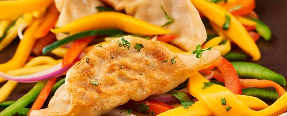 Pork Pot Stickers with Red Pepper Jam & Pickled Mango Slaw