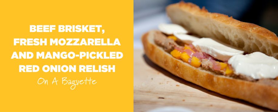 Beef Brisket, Fresh Mozzarella and Mango-Pickled Red Onion Relish on a Baguette